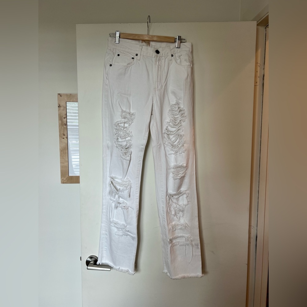 Alice and Olivia ripped white jeans.